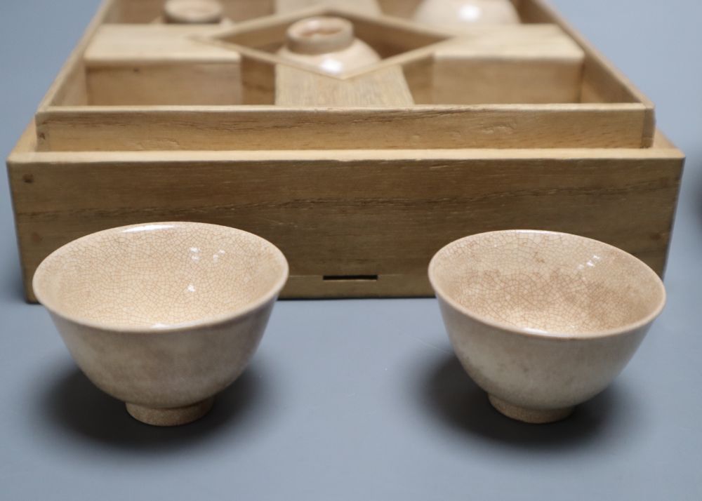 A Japanese Ko Satsuma Chawan, 18th century, a Newhall tea bowl and saucer and a Yixing style redware teapot,